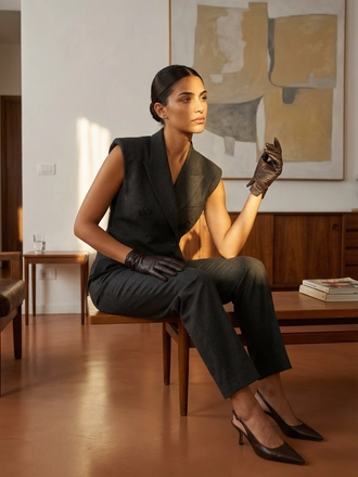 Photorealistic on-model full body photo — living lifestyle — created with ANZURES