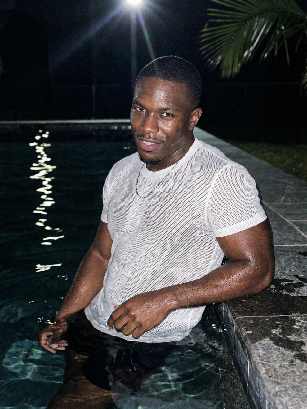 Photorealistic on-model half body photo — midnight influencer — created with ANZURES