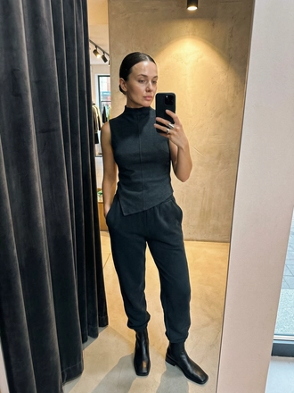 Photorealistic on-model full body photo — mirror influencer — created with ANZURES